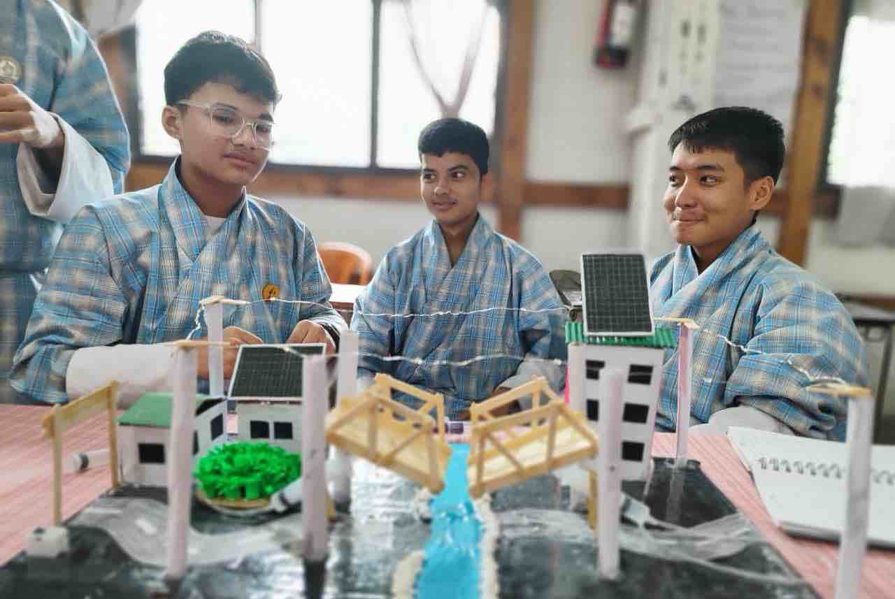 Students presenting work during a science exhibition at PHSS